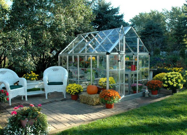 Snap & Grow Greenhouse – a durable, easy-to-assemble greenhouse with a clear polycarbonate panel design, providing optimal sunlight for plant growth.