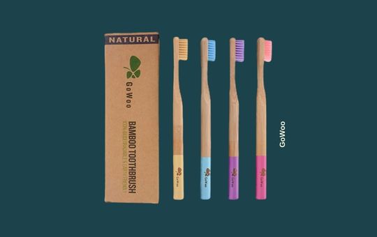GoWoo natural bamboo toothbrush with soft bristles, eco-friendly and biodegradable for a sustainable oral care routine.