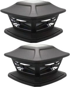 DaVinci solar post cap lights illuminating the top of a fence post with soft, warm light, featuring durable, weather-resistant materials and solar panels for energy-efficient outdoor lighting.