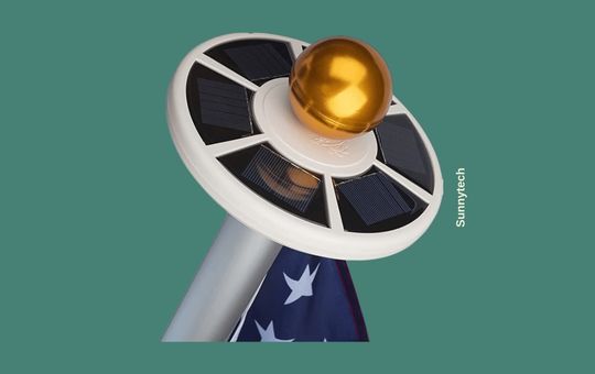 Sunnytech 2nd Generation solar flag pole light attached to a flagpole, featuring enhanced LED brightness, durable weather-resistant construction, and a solar-powered design for reliable nighttime illumination.