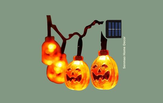 Senmao Home Decor LED Pumpkin Halloween Lights in a spooky outdoor setting, illuminating the yard with a festive Halloween glow.