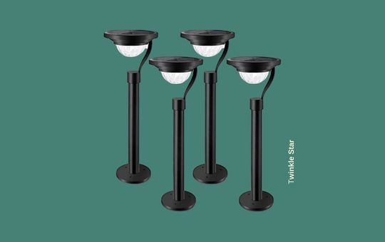 Twinkle Star 50 Lumens Solar Pathway Lights illuminating outdoor walkways with bright, energy-efficient LED lighting.