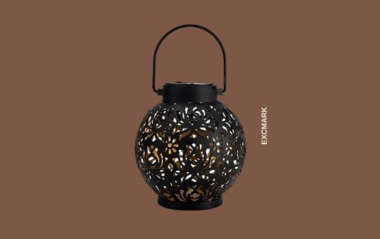 EXCMARK Decorative Hanging Lantern with intricate design, soft LED lighting, and solar-powered functionality, perfect for adding charm and ambiance to outdoor spaces.