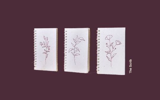 The Scrib notebook featuring a minimalist design with eco-friendly materials, including recycled paper and a durable cover, perfect for sustainable writing and journaling.