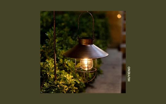 HUYIENO solar-powered metal hanging lantern lights with intricate patterns, perfect for outdoor ambiance and garden decor.