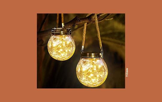 Yiliaw hanging solar lights, designed for outdoor use, providing energy-efficient lighting for gardens, patios, and pathways.