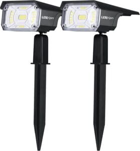 LEREKAM solar spotlights installed in a garden, providing bright, adjustable LED lighting powered by solar energy.