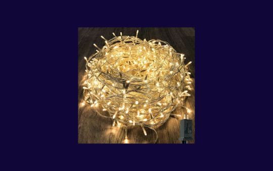 KAQ 300LED Solar String Lights featuring vibrant multi-colored LEDs, designed for festive outdoor decoration with energy-efficient solar power and automatic operation.