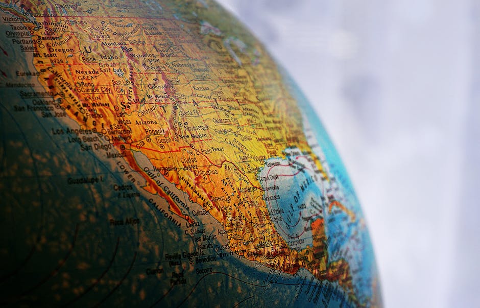 Close-up of a globe highlighting North America, showcasing geography and cartography details.